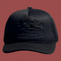 All-Black Vintage Trucker Hat with Tonal Stars and Cruise Ship Graphic
