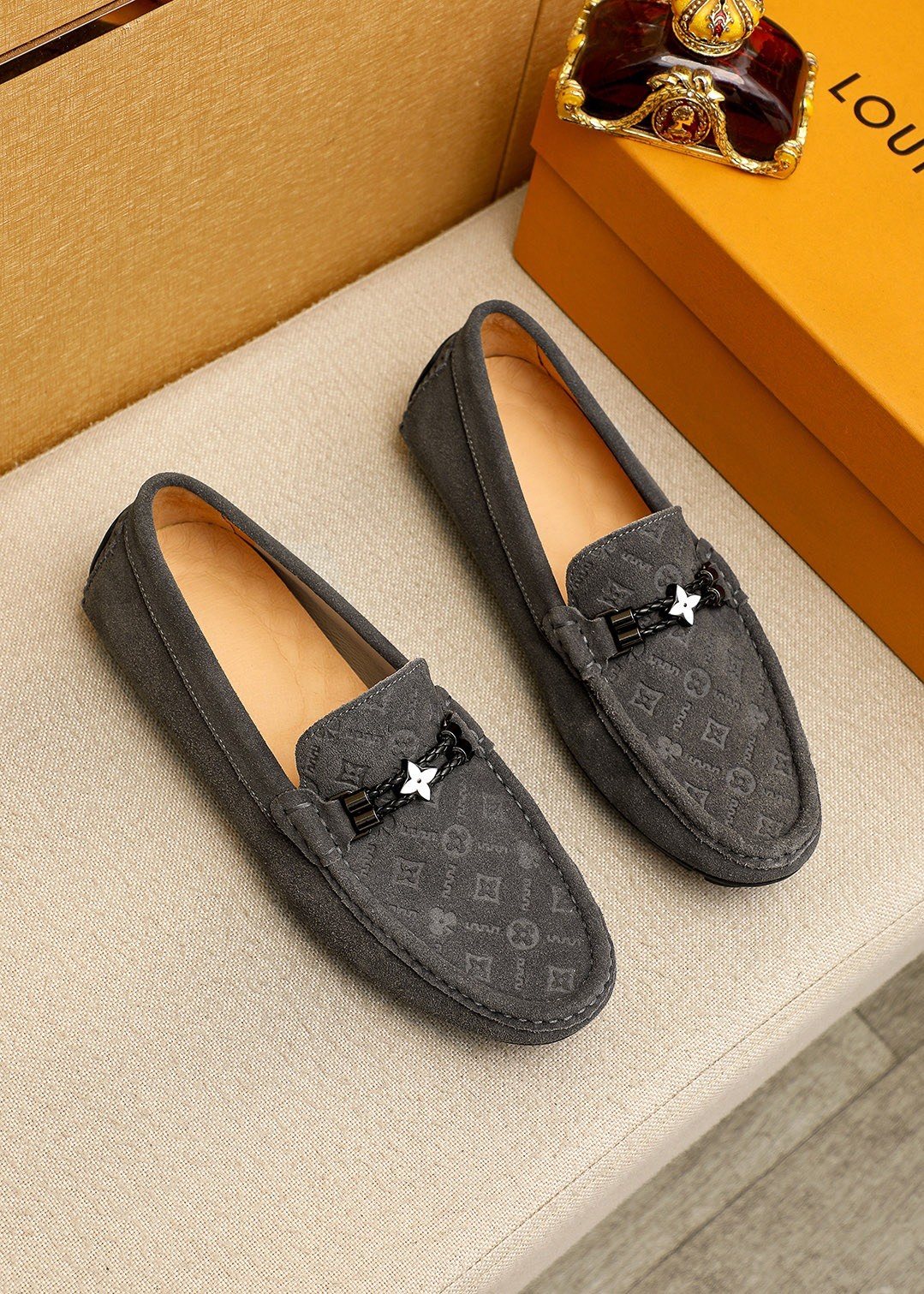 Louis Vuitton Embossed Metal-Detail Loafers
