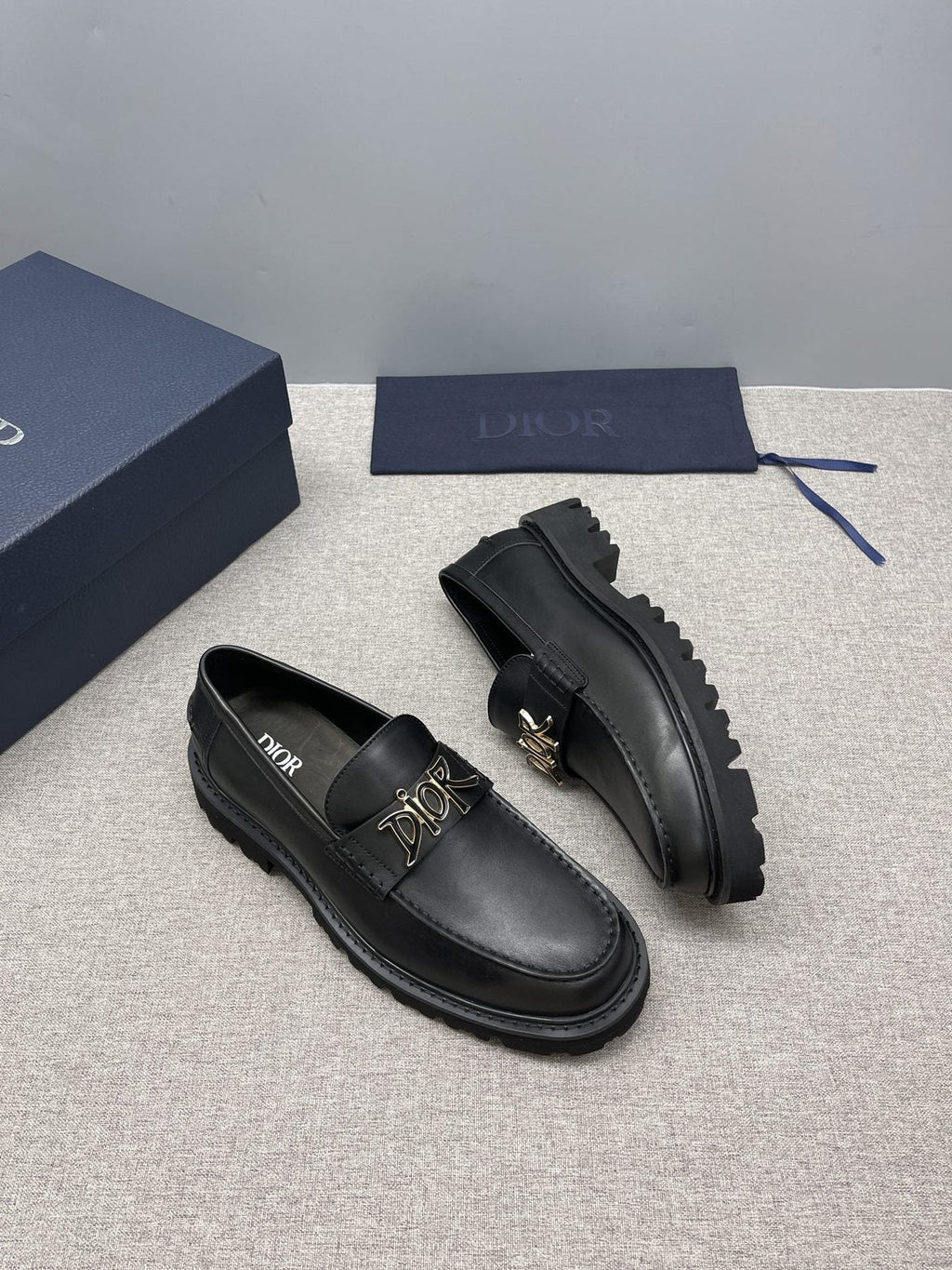Dior Men's Black Gold-Plaque Slip-On Shoes